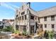 Stately brick home showcasing detailed architecture, manicured landscaping, and an inviting outdoor space perfect for entertaining at 122 Gainey Ln, Chattahoochee Hills, GA 30268