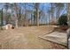Large backyard with shed and wooded area at 1836 Poinsetta Dr, Acworth, GA 30102