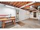 Unfinished basement with workshop area and exterior access at 1836 Poinsetta Dr, Acworth, GA 30102