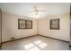 Sunny bedroom with carpet flooring and a ceiling fan at 1836 Poinsetta Dr, Acworth, GA 30102