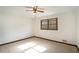 Bright bedroom with carpet flooring and a ceiling fan at 1836 Poinsetta Dr, Acworth, GA 30102