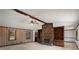 Spacious living room with brick fireplace and built-in shelves at 1836 Poinsetta Dr, Acworth, GA 30102