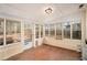 Bright sunroom with wood floors and access to deck at 1836 Poinsetta Dr, Acworth, GA 30102