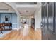 Welcoming foyer with hardwood floors, high ceilings, and staircase with decorative railing at 785 Charleston Dr, Roswell, GA 30075