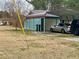 Carport with two cars parked underneath at 583 Lakeridge Se Dr, Conyers, GA 30094