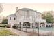Back exterior of home with a pool, patio, and view of the upper-level balcony at 3184 Islesworth Trce, Duluth, GA 30097