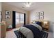 Cozy bedroom with star rug, comfortable bed, and natural light from the window at 3184 Islesworth Trce, Duluth, GA 30097