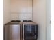 Modern laundry room featuring Samsung washer and dryer, providing convenience and efficiency at 3184 Islesworth Trce, Duluth, GA 30097