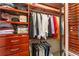 Large walk-in closet with custom shelving and hanging rods at 5339 Saville Nw Dr, Acworth, GA 30101