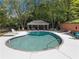 Community pool with a relaxing gazebo and lounge chairs at 5339 Saville Nw Dr, Acworth, GA 30101