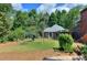 Spacious backyard with playground and ample green space at 619 Champions Dr, Mcdonough, GA 30253