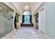 Spa-like bathroom with a large soaking tub, walk-in shower, and chandelier at 619 Champions Dr, Mcdonough, GA 30253