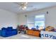 Spacious bedroom with large window and toys at 619 Champions Dr, Mcdonough, GA 30253