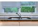 Double stainless steel sink with granite countertop at 619 Champions Dr, Mcdonough, GA 30253