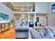 High-ceilinged living room with hardwood floors and luxurious furnishings at 619 Champions Dr, Mcdonough, GA 30253