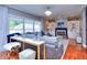 Relaxing living room featuring hardwood floors, fireplace, built-ins at 619 Champions Dr, Mcdonough, GA 30253
