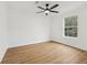 Bedroom with hardwood floors and a ceiling fan, creating a comfortable and inviting space at 1111 Osborne Sw St, Atlanta, GA 30310