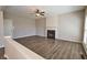 Relaxing living room with fireplace and hardwood floors at 3865 Chastatee Dr, Duluth, GA 30097