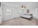 Spacious bedroom with carpeted floor and ceiling fan at 2858 Spring Villa Se Ln, Smyrna, GA 30080