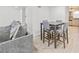 Small dining area with four chairs and a view into the kitchen at 2858 Spring Villa Se Ln, Smyrna, GA 30080