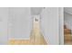 Light and bright hallway with light wood flooring at 2858 Spring Villa Se Ln, Smyrna, GA 30080
