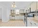 Modern kitchen with stainless steel appliances and light cabinets at 2858 Spring Villa Se Ln, Smyrna, GA 30080