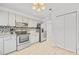 Modern kitchen with stainless steel appliances and light cabinets at 2858 Spring Villa Se Ln, Smyrna, GA 30080