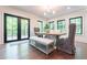 Elegant dining room with hardwood floors and French doors leading to deck at 5666 Long Island Nw Dr, Atlanta, GA 30327