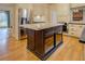 Kitchen island with white marble top and dark wood base at 960 Todd Dr, Covington, GA 30014