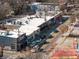 Aerial view of the commercial district with a view of retail storefronts and parking at 1770 Rockland Se Dr, Atlanta, GA 30316