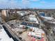 East Atlanta Village aerial view shows the vibrant street, storefronts, and skyline at 1770 Rockland Se Dr, Atlanta, GA 30316