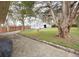 Spacious backyard features a shed and a beautiful mature tree at 1770 Rockland Se Dr, Atlanta, GA 30316