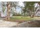 Wide, grassy backyard with mature trees and shed at 1770 Rockland Se Dr, Atlanta, GA 30316