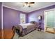 Bedroom features a window, hardwood floors in entryway, and neutral colored walls at 1770 Rockland Se Dr, Atlanta, GA 30316