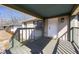 Welcoming front porch with a gray painted deck and white brick exterior at 1770 Rockland Se Dr, Atlanta, GA 30316