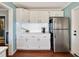 Functional kitchen area featuring ample cabinet space and a stainless steel refrigerator at 1770 Rockland Se Dr, Atlanta, GA 30316