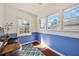 Bright office space with multiple windows, providing ample natural light, and hardwood floors at 1770 Rockland Se Dr, Atlanta, GA 30316