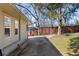 Back view of house shows spacious yard with privacy fence and parking at 1770 Rockland Se Dr, Atlanta, GA 30316