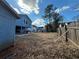 Backyard with a view of neighboring houses at 220 Canterbury Ln, Lawrenceville, GA 30046