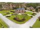 Stunning aerial view of a brick home featuring a lush lawn and meticulous landscaping at 2280 Wilshire Dr, Grayson, GA 30017