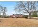 Landscaped yard behind the house at 2280 Wilshire Dr, Grayson, GA 30017