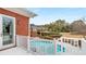 Deck overlooking the pool and backyard at 2280 Wilshire Dr, Grayson, GA 30017