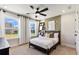 Bright bedroom with a large window, stylish decor, and plenty of natural light at 5270 Birch Valley Rd, Cumming, GA 30028