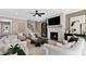 Living room with fireplace, modern furnishings, and ample natural light at 5270 Birch Valley Rd, Cumming, GA 30028