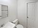 Clean bathroom with updated vanity, toilet, and shower at 9129 Bent Pine Ne Ct, Covington, GA 30014