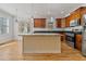 View of kitchen island with granite countertop and custom cabinetry at 1379 Benteen Park Se Dr, Atlanta, GA 30315