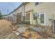 Fenced backyard featuring a patio and drought-resistant landscaping at 162 Townview Dr, Woodstock, GA 30189