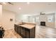 Open concept living room with a fireplace and lots of natural light at 162 Townview Dr, Woodstock, GA 30189