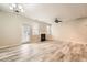 Spacious living room with a cozy fireplace and lots of natural light at 162 Townview Dr, Woodstock, GA 30189
