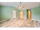 Large main bedroom featuring vaulted ceilings and hardwood floors at 162 Townview Dr, Woodstock, GA 30189